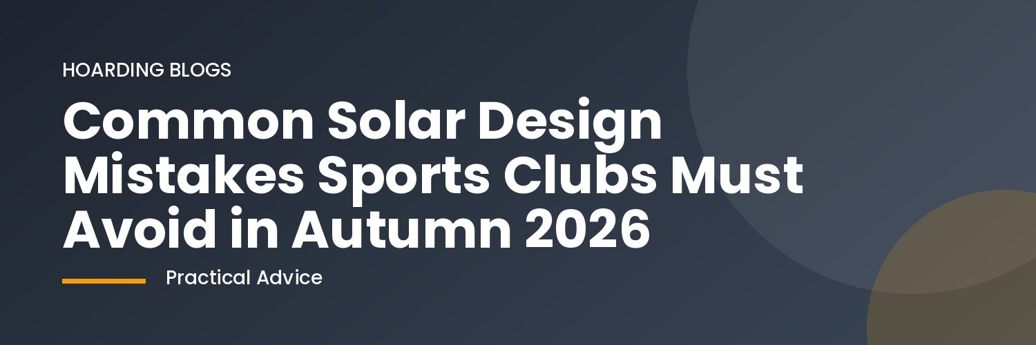 Sports club solar panels and pitch in autumn sunlight